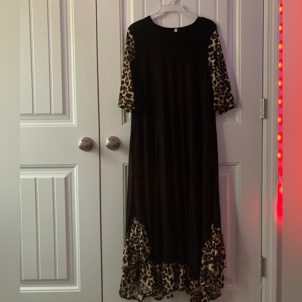 Black dress cheetah print sleeves and bottom